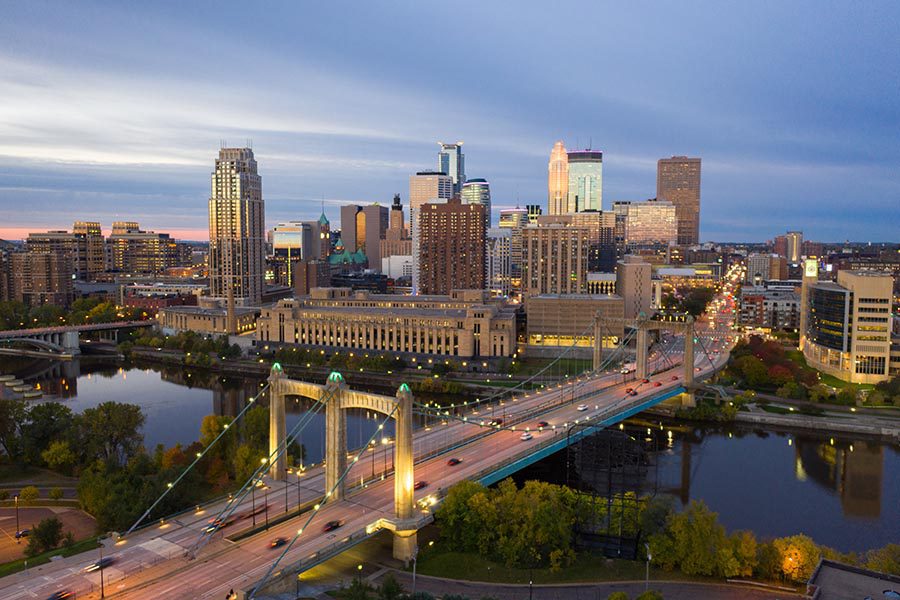 About Our Agency - Minneapolis, Minnesota Seen From Above, a Busy Bridge in the Foreground